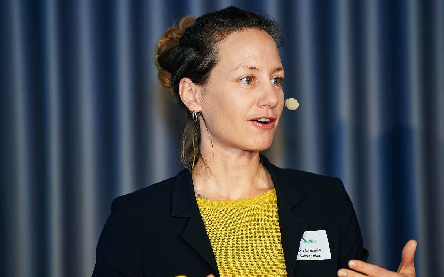 Nina Bachmann während seiner Rede auf dem Textilsymposium 2024.