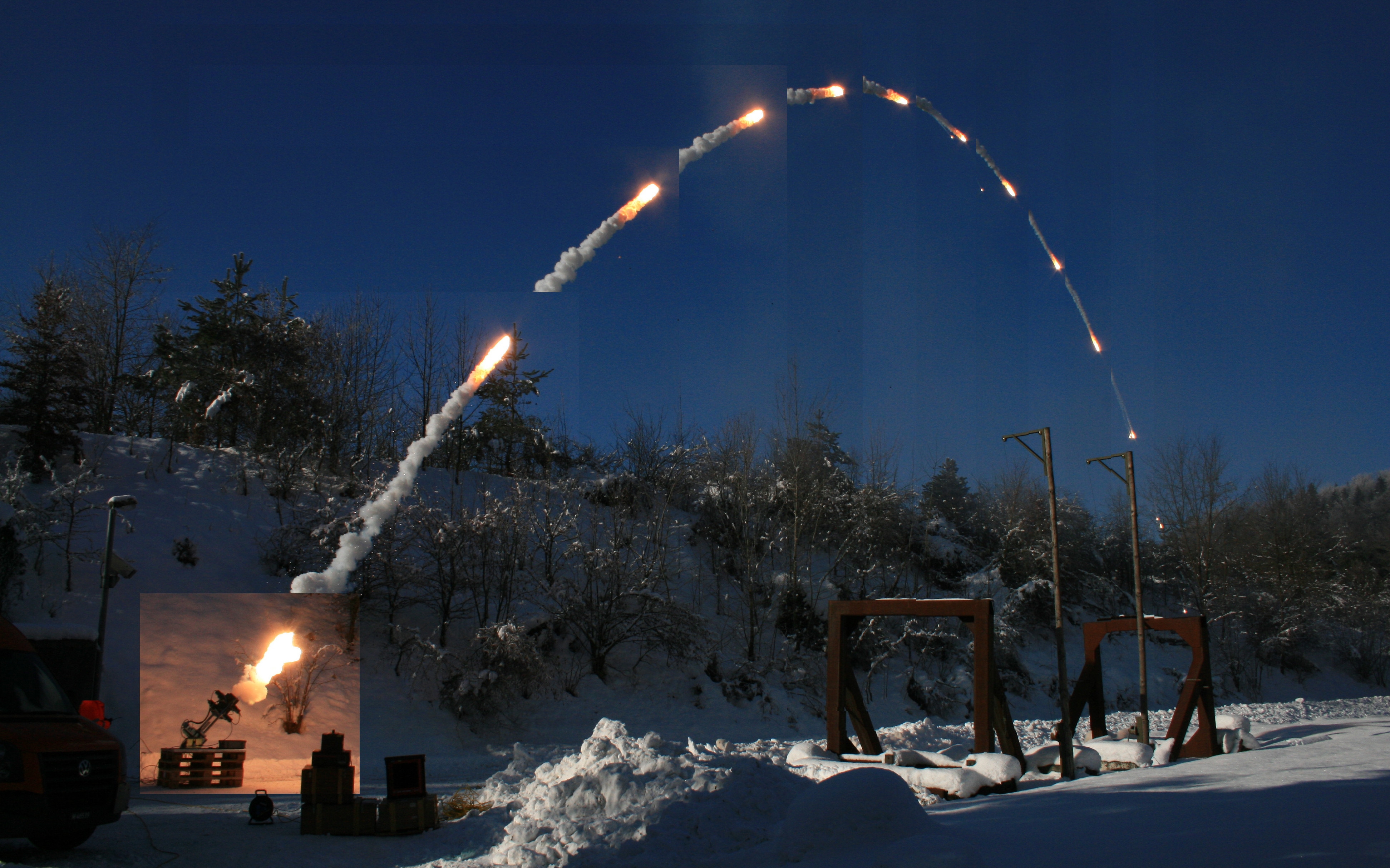 A mortar fires a shot in a winter landscape
