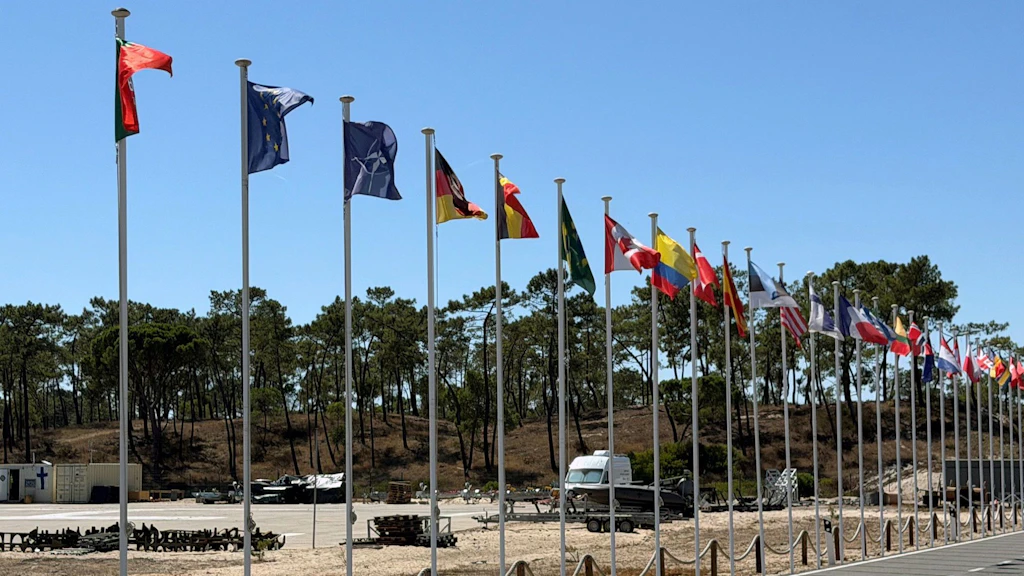 A line of flags representing the countries taking part in the exercise