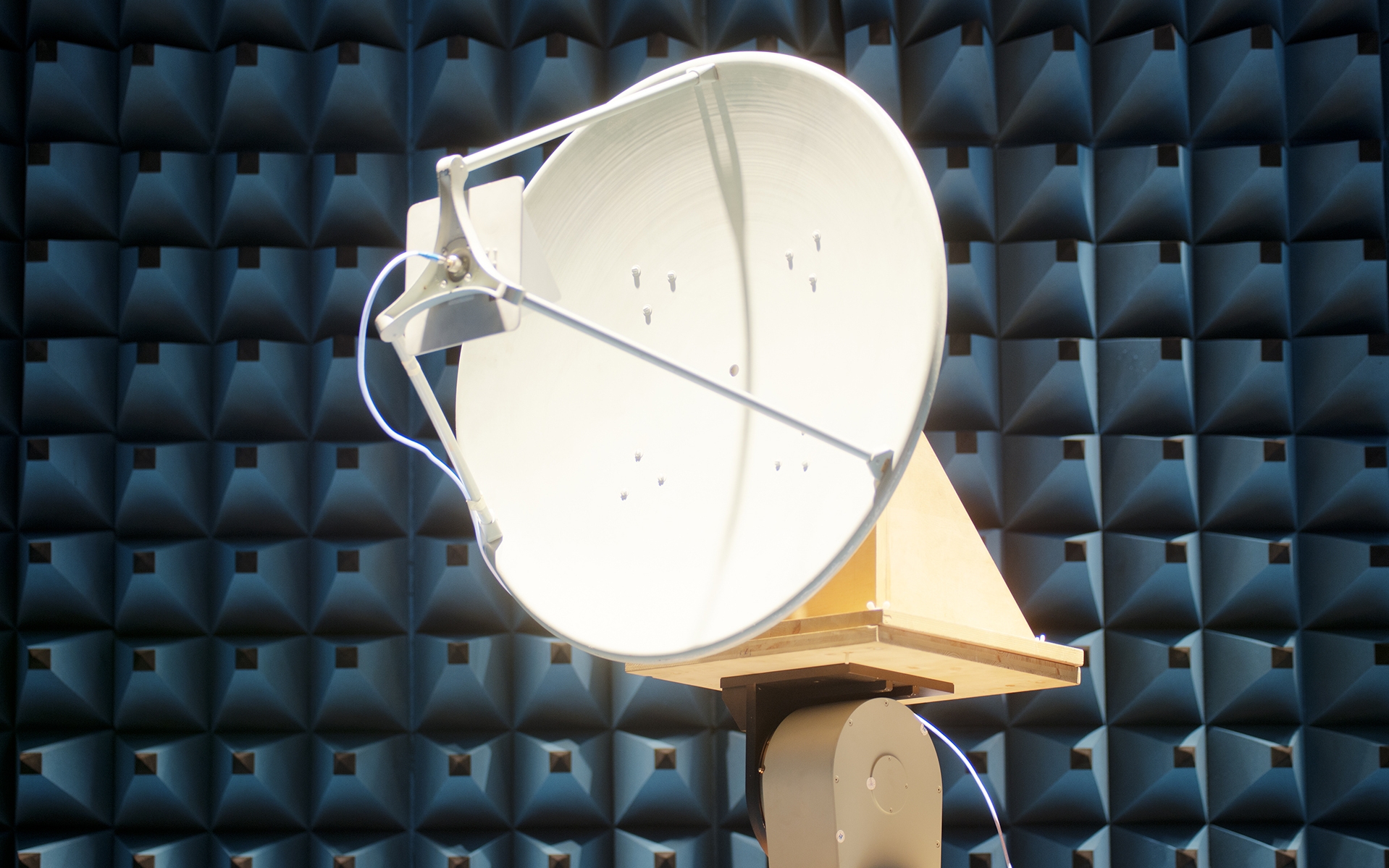 A radar antenna stands in the EMC hall