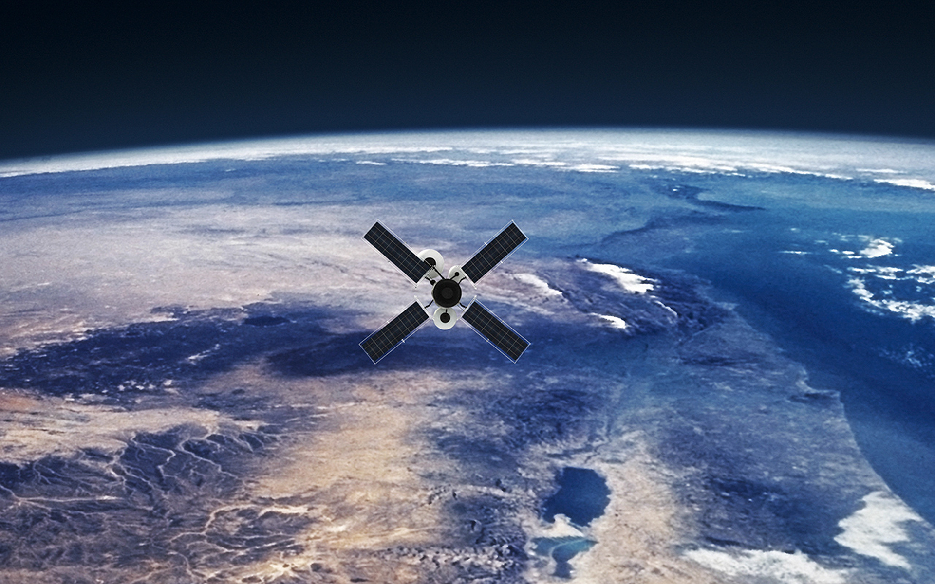 A satellite hovers above the earth