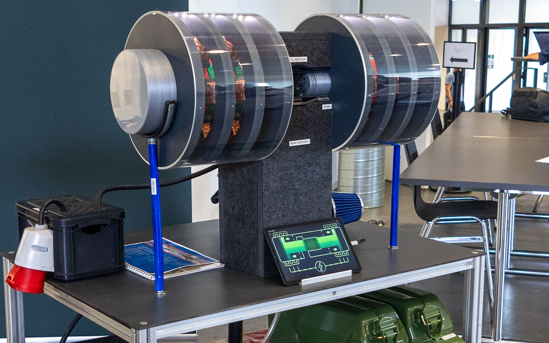 A futuristic motor with two turbines is shown.