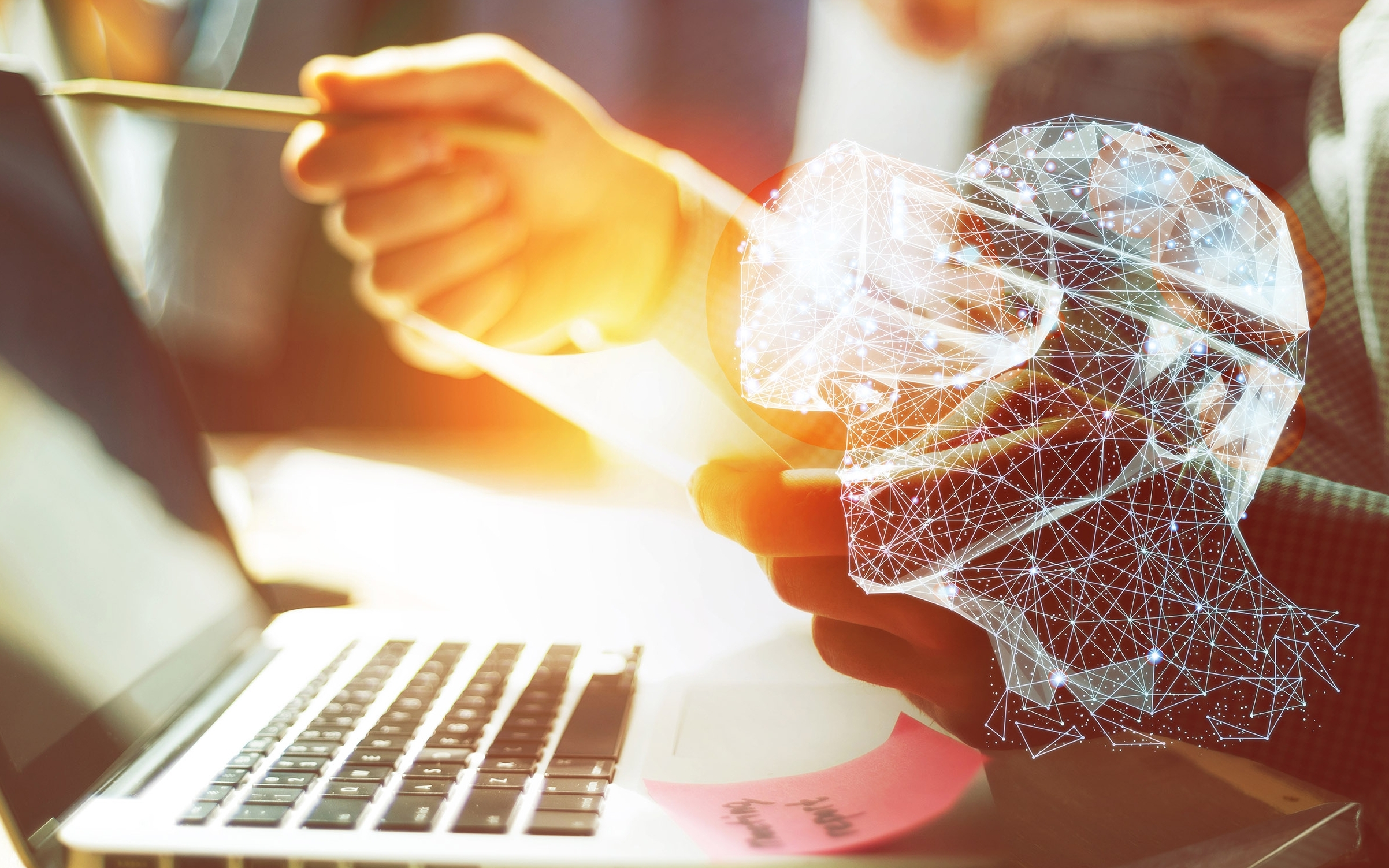 Une tête numérique porte des lunettes VR et regarde un écran