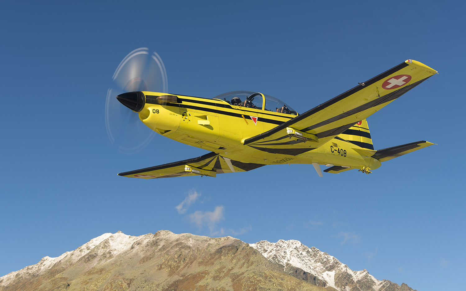 Image d'un avion PC-9 en vol
